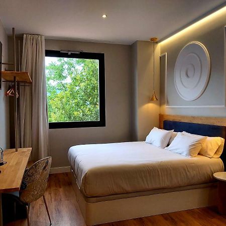 Habital Suites ฮากา ภายนอก รูปภาพ