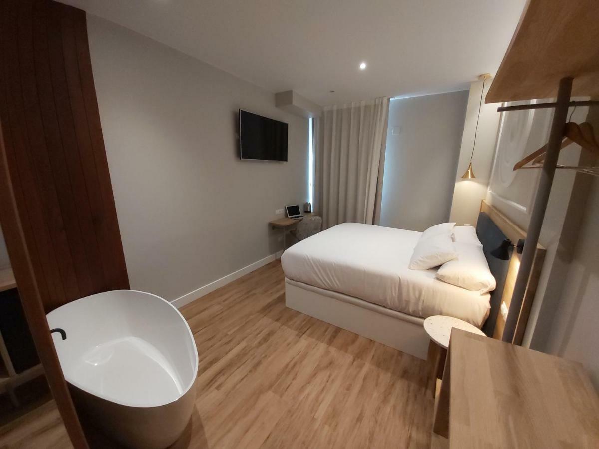 Habital Suites ฮากา ภายนอก รูปภาพ